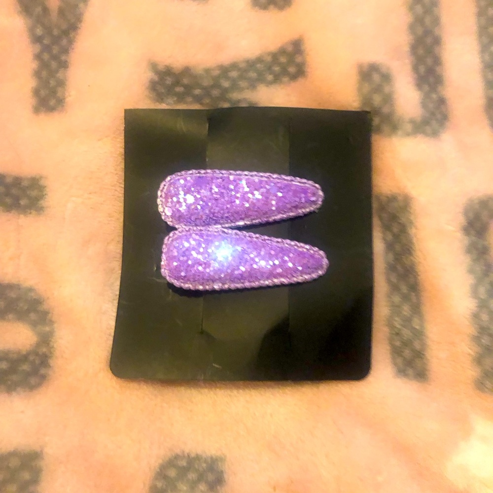 2 purple sparkly hair clips